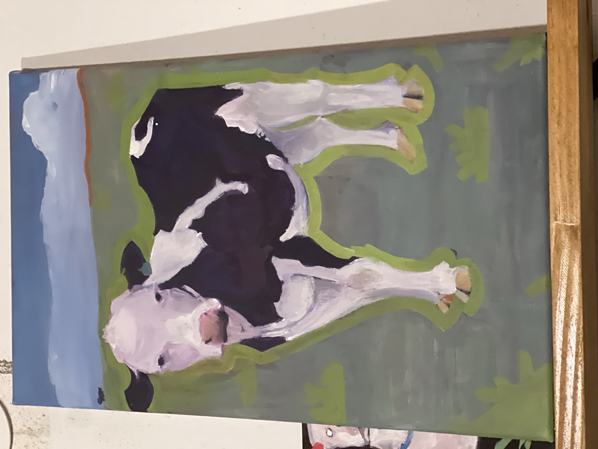 This is a painting of a Holstein cow standing in a field. The cow is black and white with pink accents on its nose and ears. The background is a field with green grass and a blue sky with white clouds. There are some other cows in the distance. The painting is done in an impressionistic style with bold brushstrokes. The painting is on a canvas and is framed in wood. There is no indication of the location in the city of Sumalao, Argentina.
