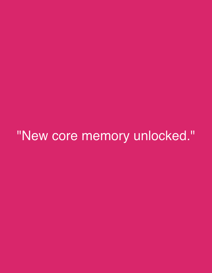 The image features the text "New core memory unlocked." centered on a pink background. The image does not depict any location, people, or objects besides the text and the background.