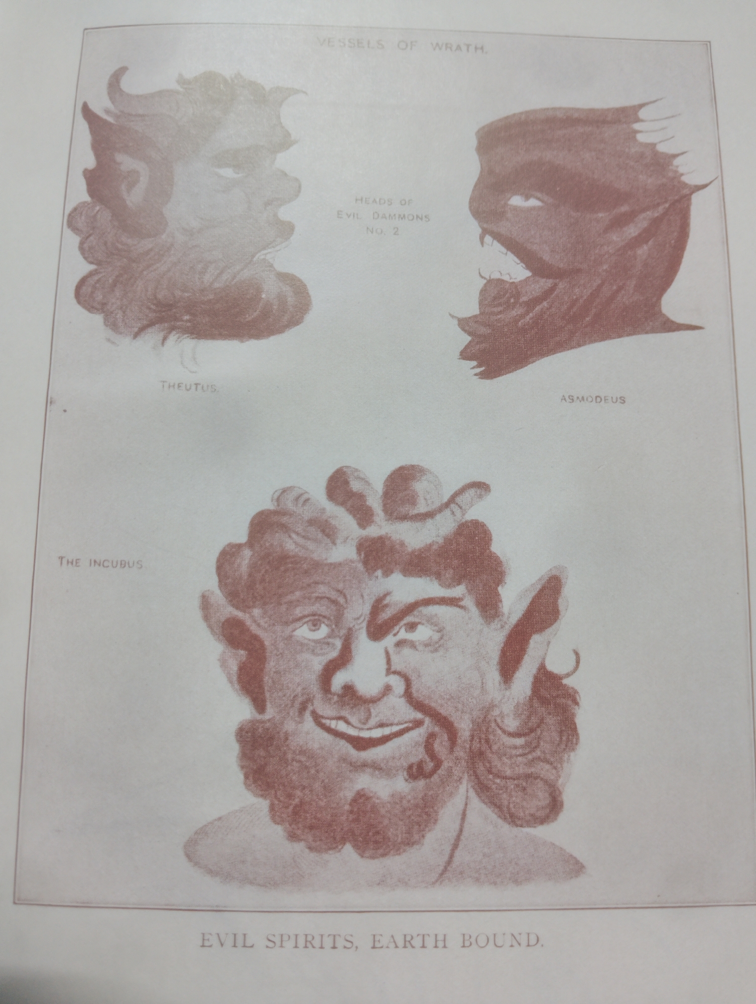 The image is a scan of a page from a book or publication featuring illustrations of demonic figures. At the top, it is captioned "VESSELS OF WRATH." Below this, there are three distinct illustrations. The top left shows a profile of a head with horns and a distressed expression, labeled "THEUTUS." The top right depicts another profile of a head with sharp teeth and wide eyes, labeled "ASMODEUS." In the center, below these two, is a caption that reads "HEADS OF EVIL DAMONS NO. 2." The bottom illustration is a frontal view of a face with horns, a beard, and a maniacal grin, labeled "THE INCUBUS." The bottom of the page has a caption that reads "EVIL SPIRITS, EARTH BOUND." The illustrations are rendered in a reddish-brown ink on a light-colored paper. There is no indication of any location in Alagbado, Nigeria, within the image or its captions.