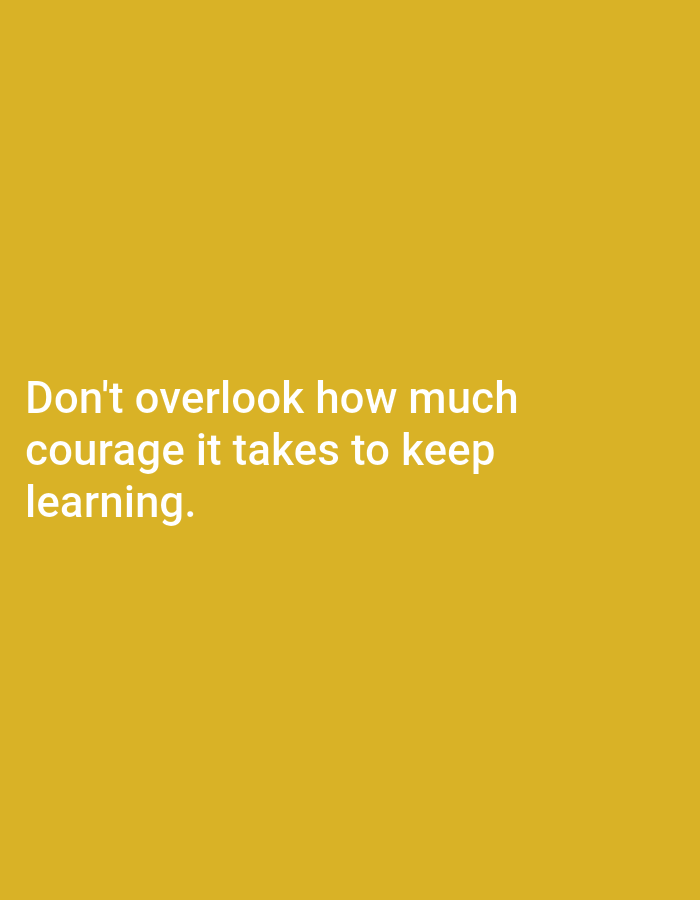 The image is a simple, text-based graphic with a yellow background. White text is displayed in the lower left quadrant, forming a quote. The quote reads: "Don't overlook how much courage it takes to keep learning." There are no people, objects, or environmental details visible in the image. The location in Tebuwung, Indonesia is not depicted or suggested by the image content.