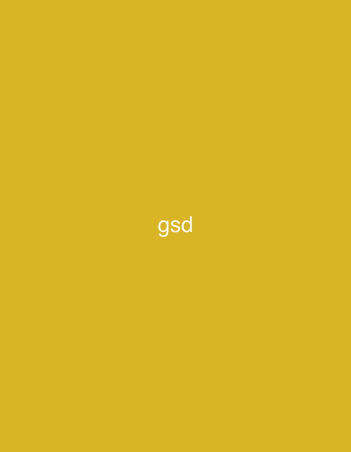 The image displays a solid, untextured mustard yellow background. Centrally positioned on this background are the three lowercase sans-serif letters 'gsd' rendered in white. The composition is an abstract digital graphic. There are no identifiable people, physical objects beyond the text, discernible actions, or interactions depicted. The environment is entirely conceptual, consisting solely of the color field and text. This abstract graphic is associated with a context or origin within the city of Casablanca, Morocco.