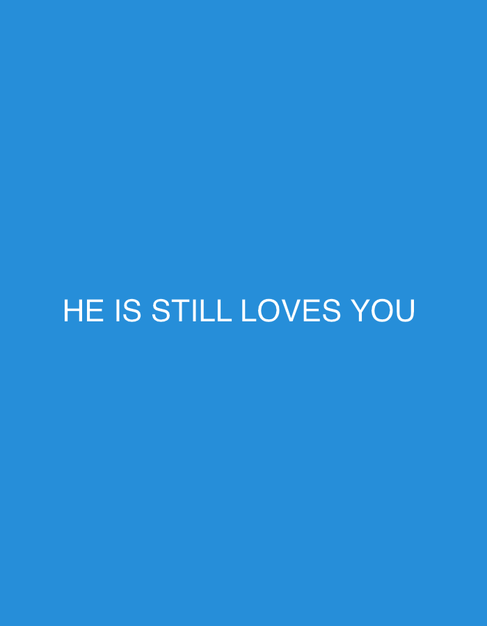 The image is a vertical, full-frame, evenly lit shot of a solid bright blue background. Centered horizontally and positioned towards the bottom of the frame is white text that reads "HE IS STILL LOVES YOU". There are no people, objects, or environmental details present in the image other than the text and background. The location in Uhlstädt-Kirchhasel, Germany is not determinable from the provided image.
