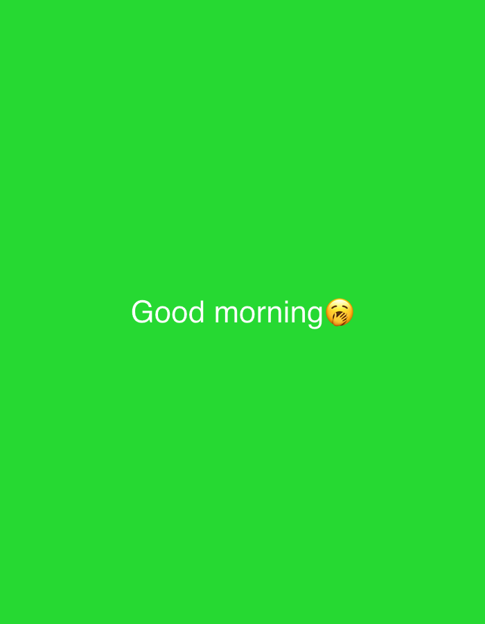 A static, full-frame, vertically oriented image shows the words "Good morning" in white text across a solid, vibrant green background. To the right of the text, a yellow emoji depicting a face with a hand over its mouth is present. There are no identifiable geographical markers to suggest a specific location in Novoaltaysk, Russia, or any other city.