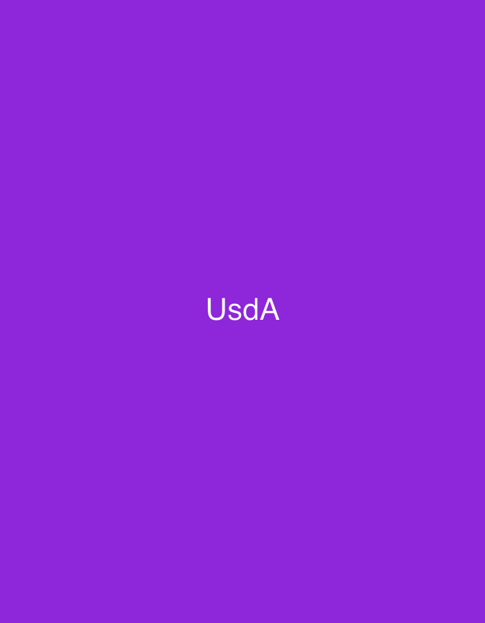 The image displays a solid purple background across its entire frame. Centered on this uniform background is the white text "UsdA," rendered in a clear, sans-serif typeface. No other visual elements, such as people, specific objects, actions, interactions, or discernible environmental details, are present in the scene. The image is abstract and provides no visual information regarding a physical location.