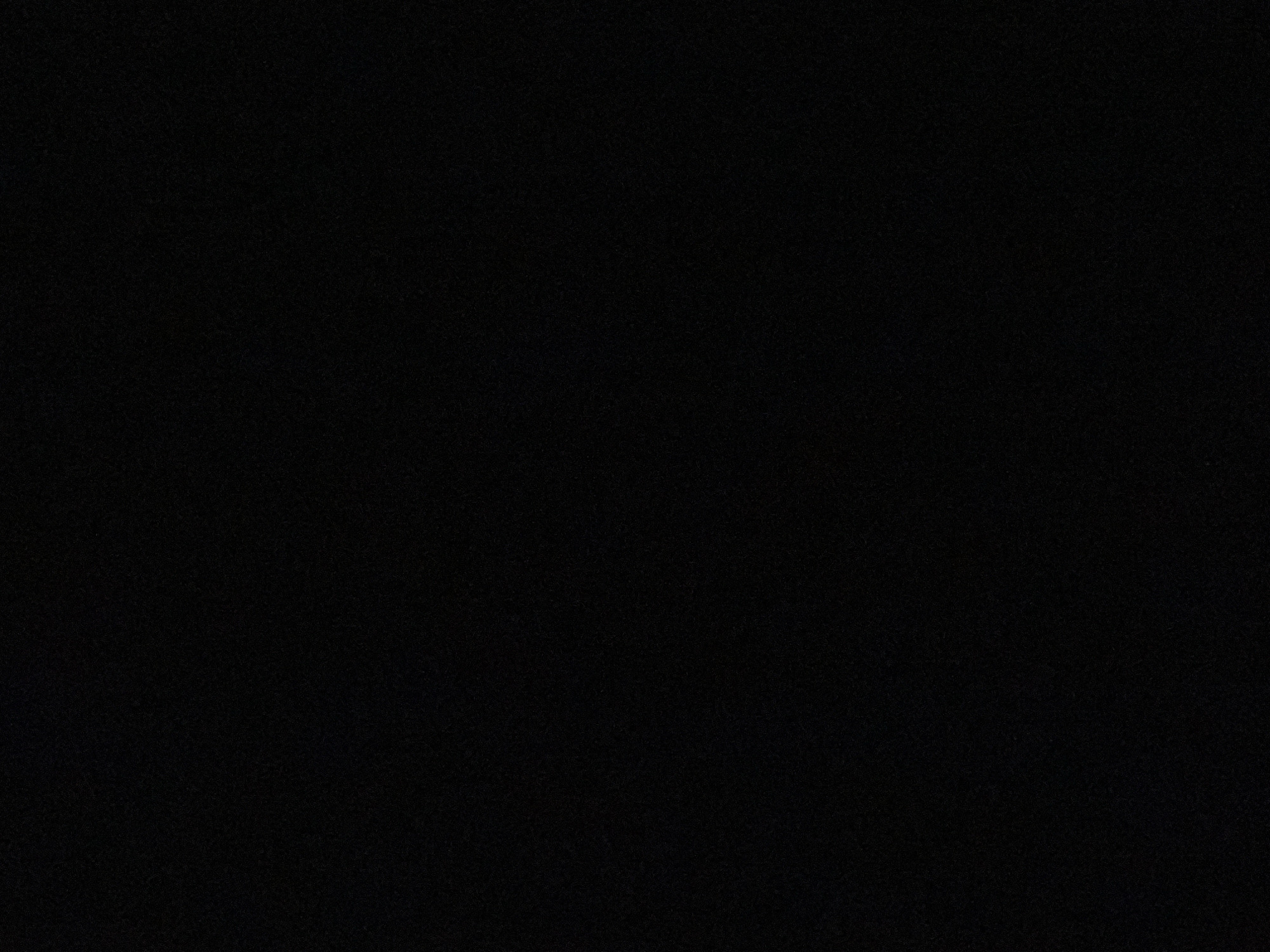 The image provided is entirely black, offering no visual information about any scene, location, or subjects within Ilorin, Nigeria, or any other place. Therefore, a detailed description is impossible.