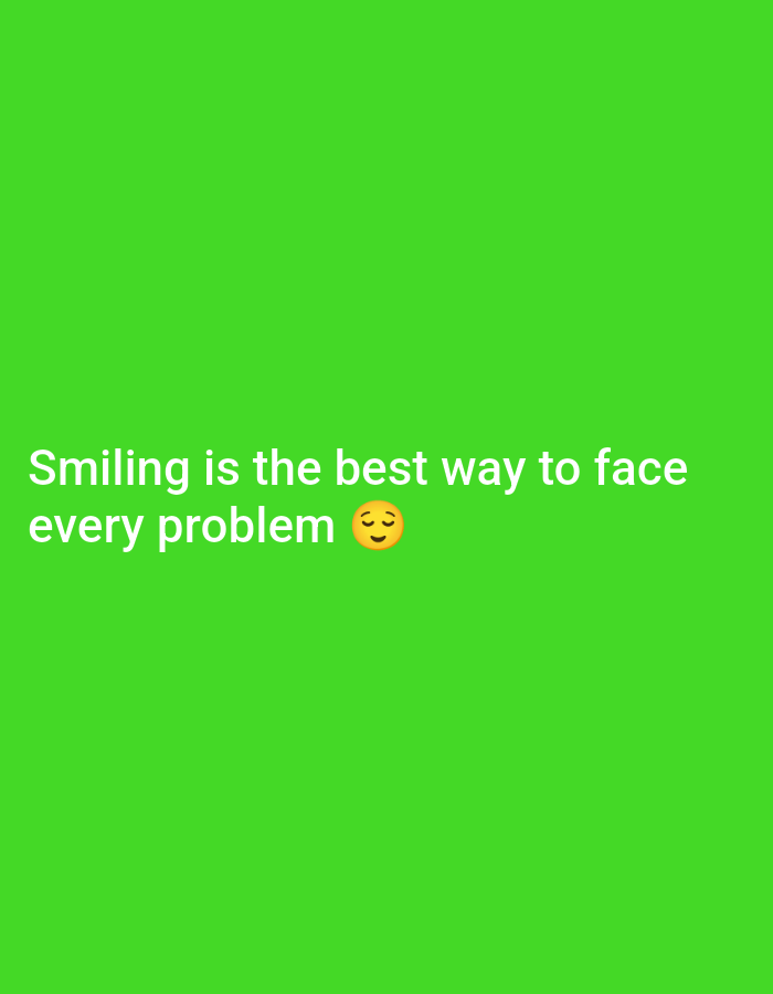 The image contains white text on a bright green background. The text reads "Smiling is the best way to face every problem" and is accompanied by a smiling emoji. The image appears to be a graphic or meme, likely created for social media or as a motivational quote. There are no discernible elements that would indicate a specific location in a city.