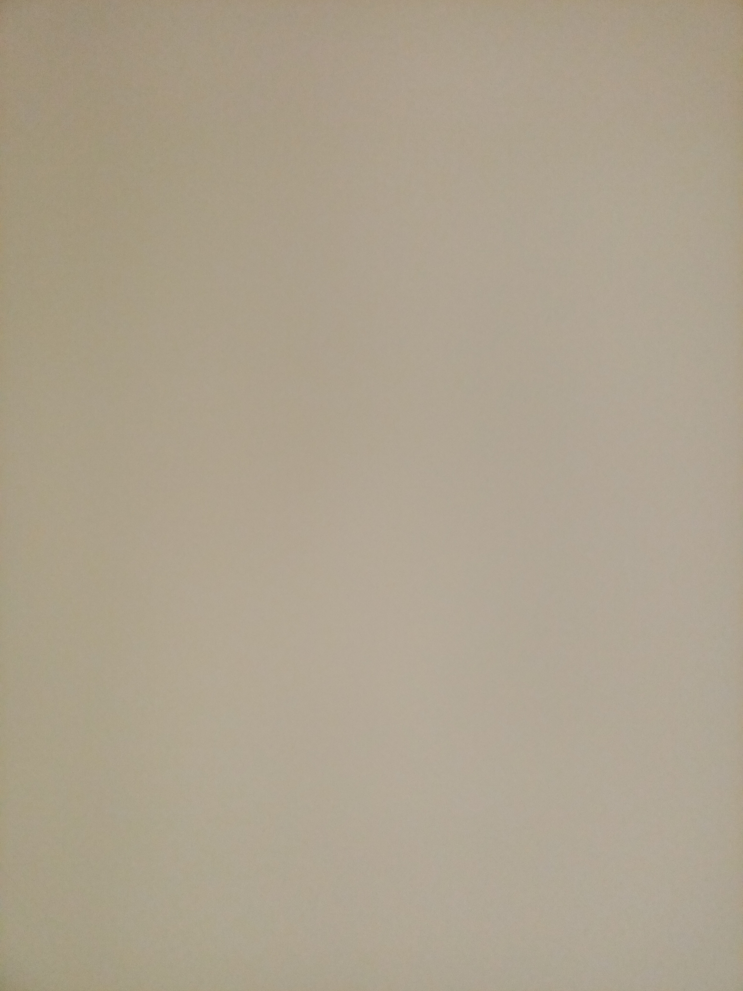 The image is a plain, light tan colored surface, likely a wall or paper, with a subtle texture visible. There are no discernible objects, people, or any environmental details that would indicate a specific location within Rostov-on-Don, Russia or anywhere else. The image is a uniform expanse of color.