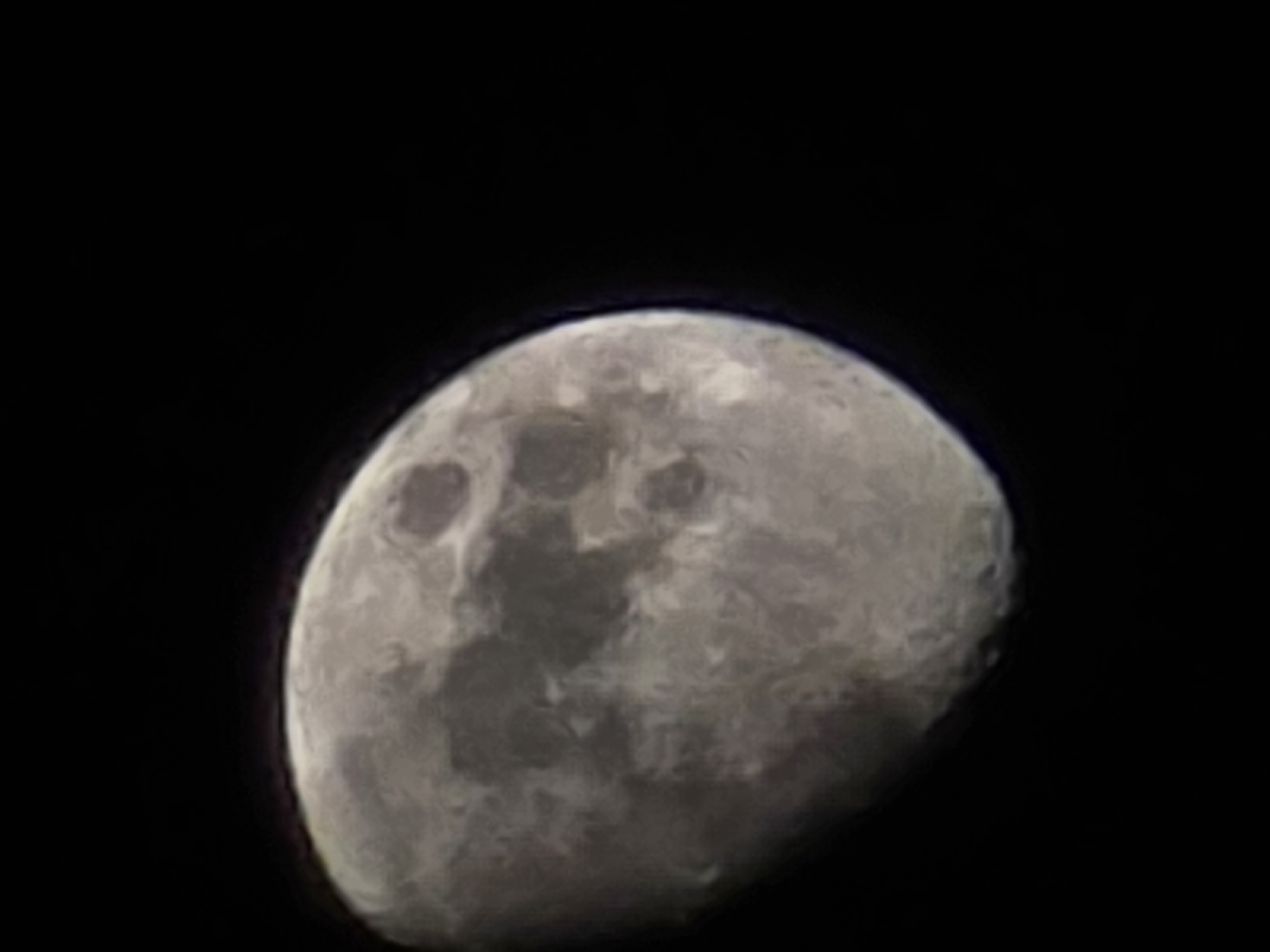 The image shows a close-up view of the moon against a black background. The moon is not fully illuminated, displaying a crescent or gibbous phase. Surface details such as craters and variations in shading are visible. There is no indication of the location of Sofia, Bulgaria, or any other elements related to that location in the image.