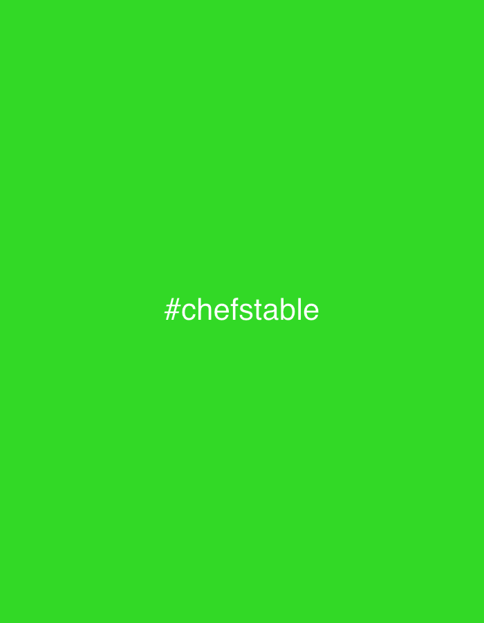 The image is a solid green background with the white text "#chefstable" centered in the middle.