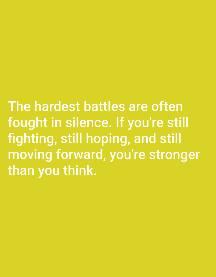 The image is a close-up shot of a yellow background with white text. The text reads: "The hardest battles are often fought in silence. If you're still fighting, still hoping, and still moving forward, you're stronger than you think." There are no people, subjects, objects, or actions visible in the image, and the environment is solely the solid yellow background. The location in the city of Алмалыбақ, Kazakhstan, is not discernible from the image.