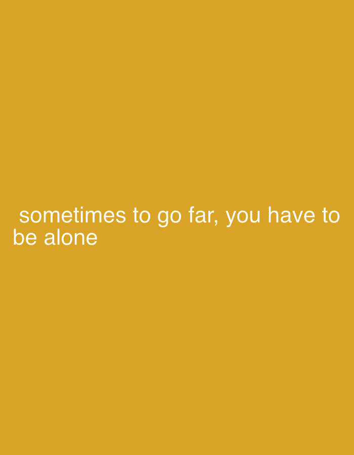 The image is a photograph with a plain, mustard-yellow background. White text is superimposed on the bottom left of the image, reading "sometimes to go far, you have to be alone". There are no people, objects, actions, or interactions depicted in the image, and no discernible environment or location, including Fez, Morocco.