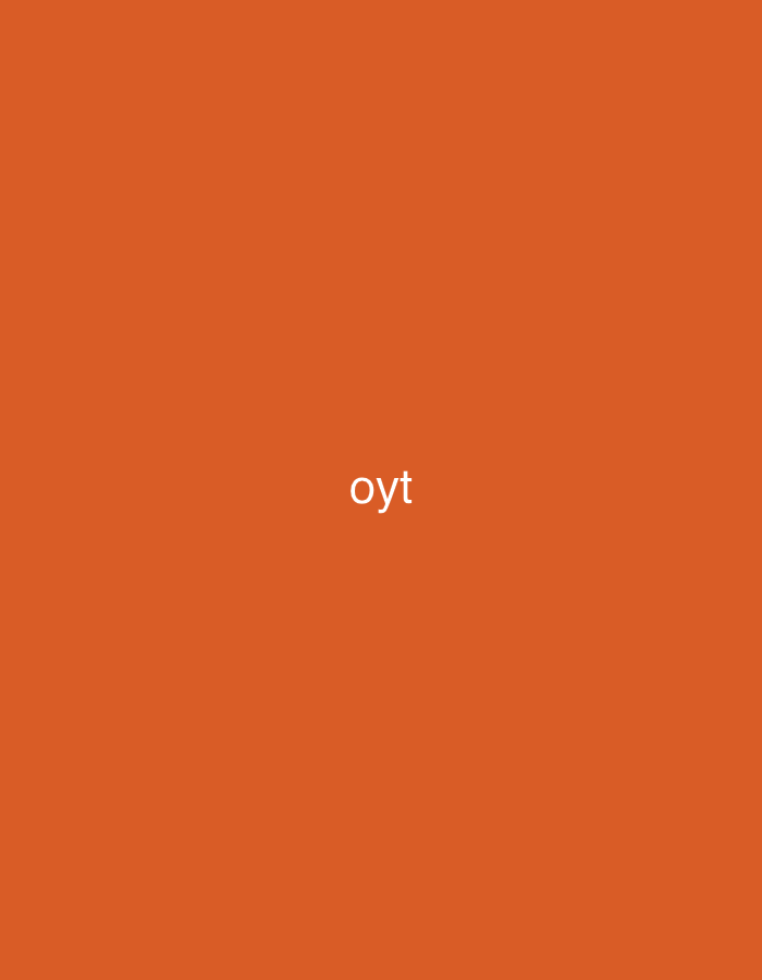 The image displays a solid, uniform orange background, characterized by a warm and rich tone resembling terracotta or burnt orange. Centrally located on this field is the word "oyt," rendered in white, lowercase sans-serif lettering. The text is the sole object in the frame. There are no people, other objects, or discernible scene elements. The image conveys no specific activity, event, time of day, weather conditions, or particular emotional context. No visual cues within the image itself suggest a specific location, such as Vagharshapat, Armenia. The composition is stark and minimalist, focusing entirely on the text set against the monochromatic backdrop.
