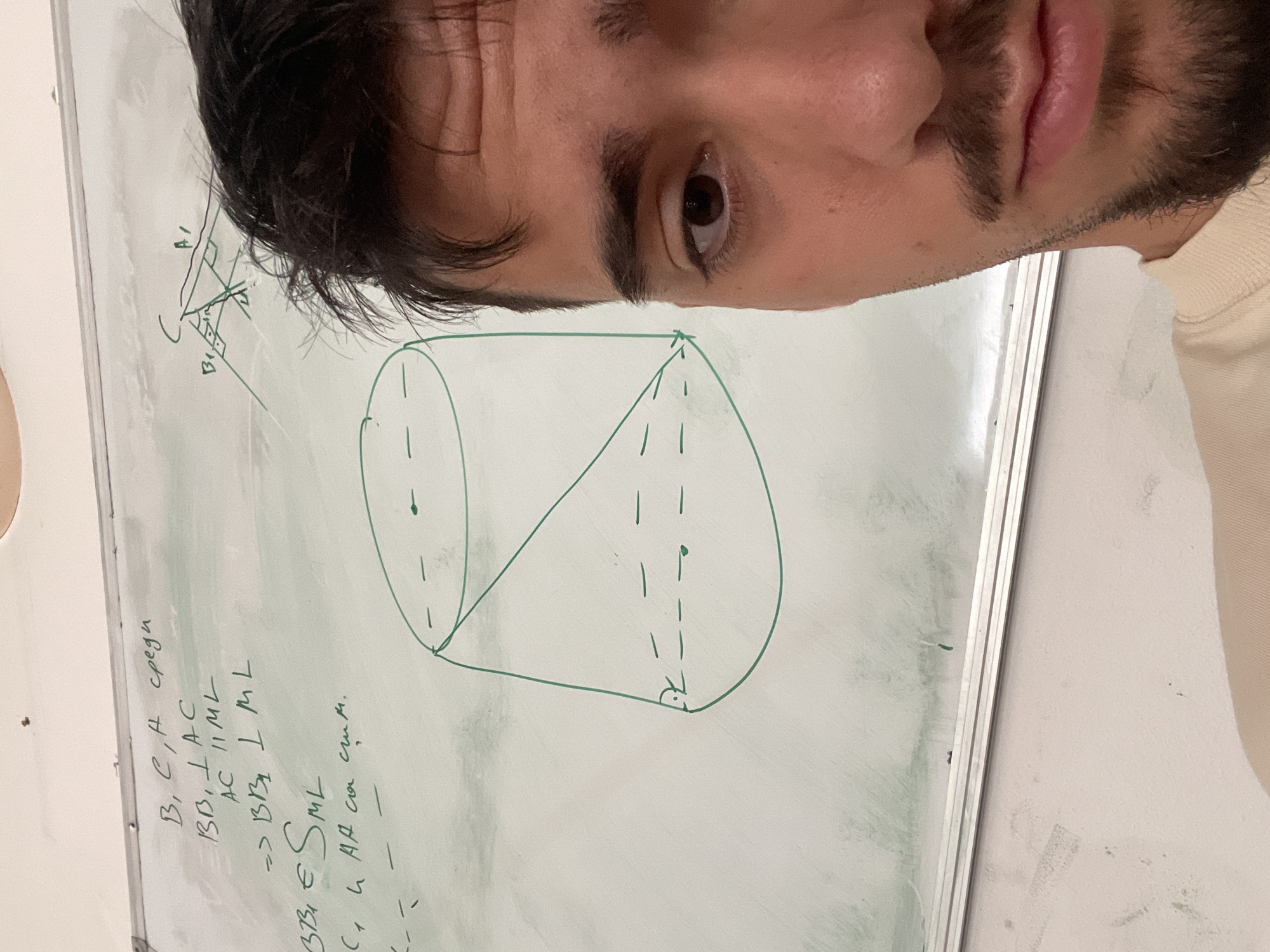 The image shows a person's face partially covering a whiteboard with mathematical diagrams and notes. The diagrams include a cylinder with a line drawn from the base to the top, and a geometric figure with perpendicular lines. The handwritten notes, in Cyrillic script, discuss geometric relationships, potentially involving perpendicularity and parallelism. The overall environment seems to be an indoor setting, likely a classroom or study area. There is no clear indication of the location in Sofia, Bulgaria.