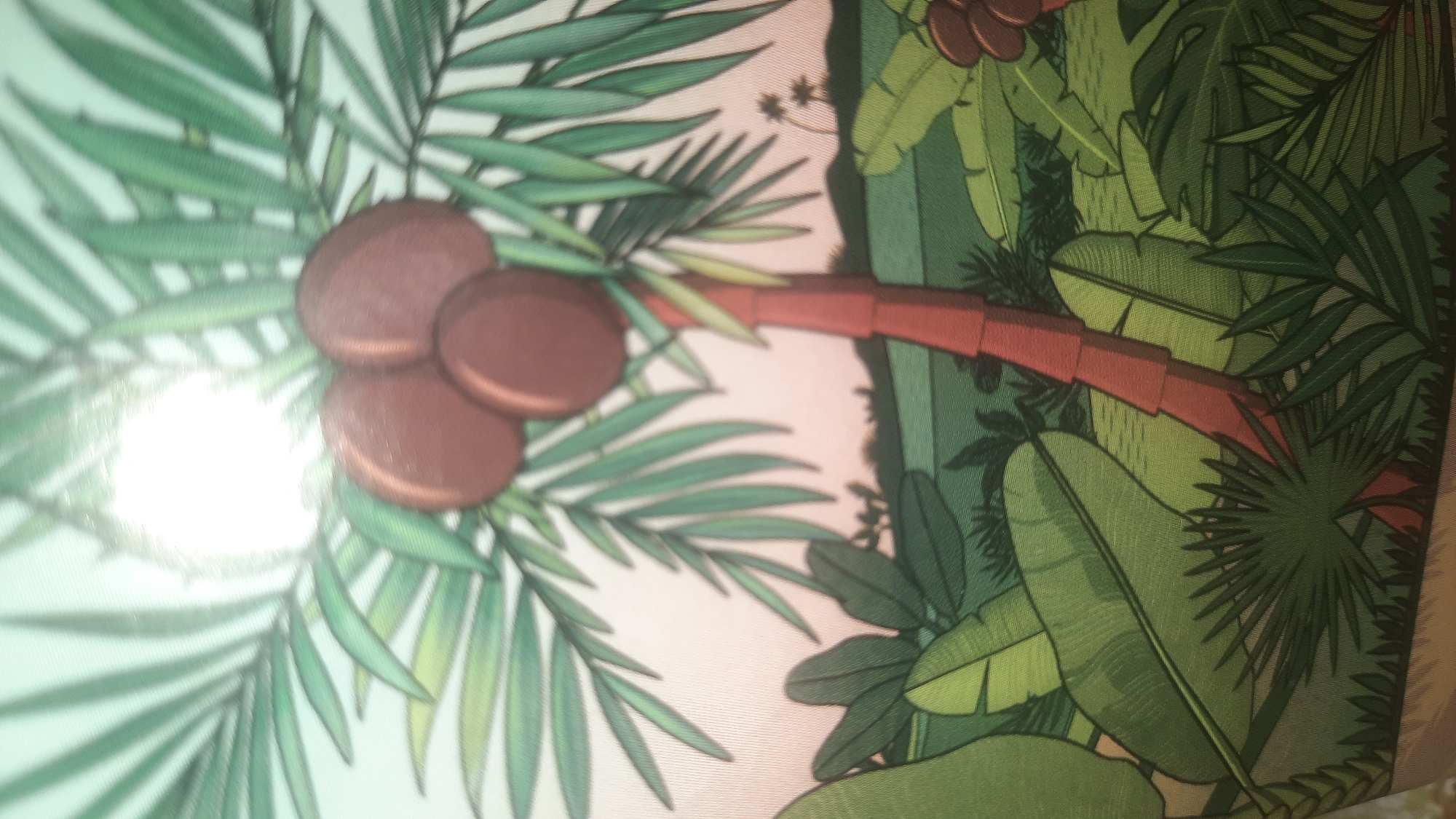 The image depicts a stylized illustration of a palm tree with three brown coconuts, set against a backdrop of lush green foliage and a pale pink sky. The palm tree has a reddish-brown trunk segmented with horizontal lines, and its fronds are a vibrant green with sharp, pointed leaves. In the foreground, various large, broad green leaves, characteristic of tropical plants like bananas or monstera, dominate the lower portion of the image. In the distance, a silhouette of hills and two smaller palm trees can be seen. The overall impression is that of a tropical or exotic landscape. There are no people or discernible actions depicted, and the image does not provide any information that could be used to determine its location within the city of Shklov, Belarus.