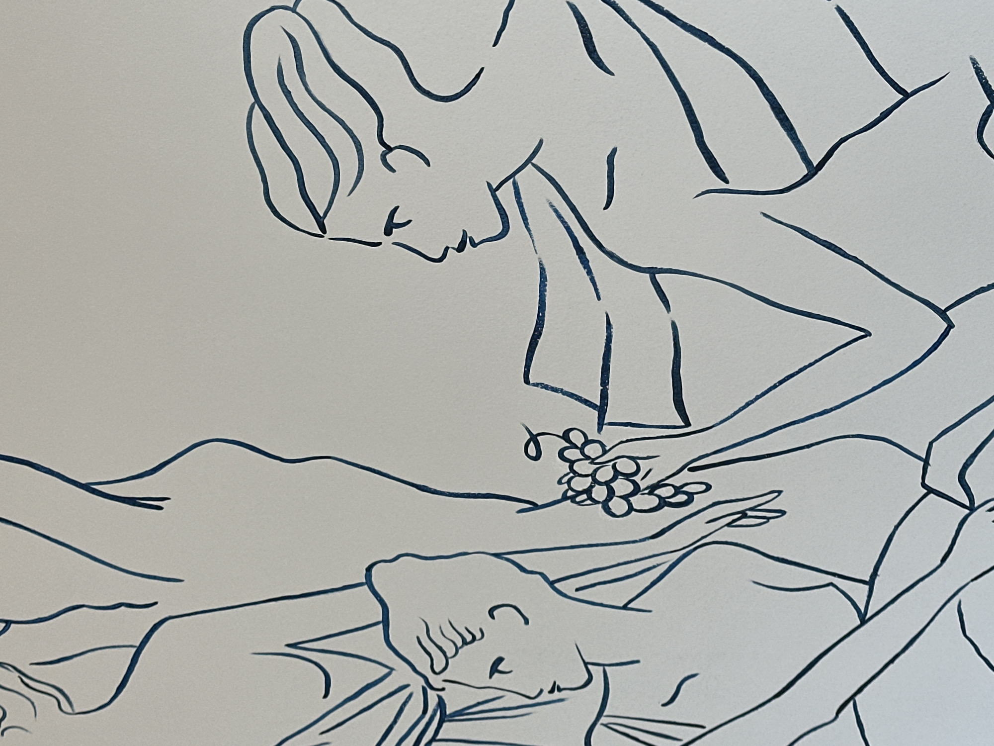The image is a line drawing depicting a classical scene, possibly a Bacchic festival. Two primary figures are identifiable. At the top, a draped woman stands, looking down and offering grapes in her hand. Below, a reclining woman lies partially draped, looking up toward the grapes. The style is reminiscent of Henri Matisse's line drawings. There is no discernible connection to the city of Boreti, Montenegro from the image content.