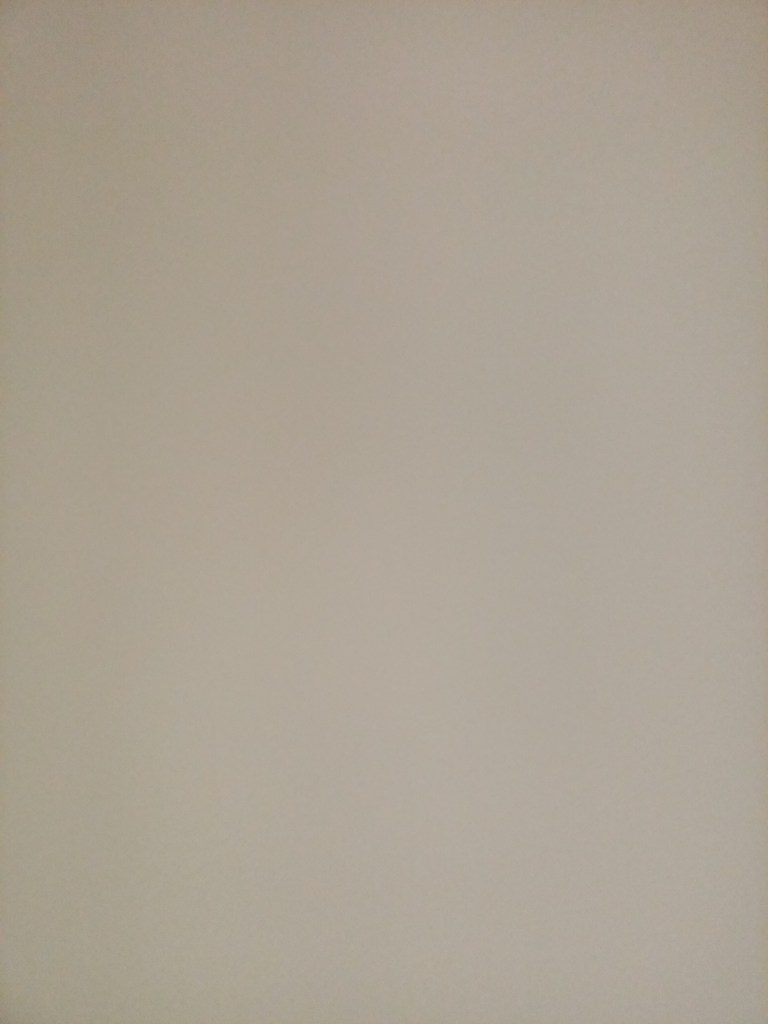 The image is a plain, textured, light beige background, possibly a wall or a piece of paper. There are no discernible objects, people, or discernible features within the frame. The lighting appears even, with no strong shadows. The image does not provide any information about a location in Rostov-on-Don, Russia, or any specific scene.