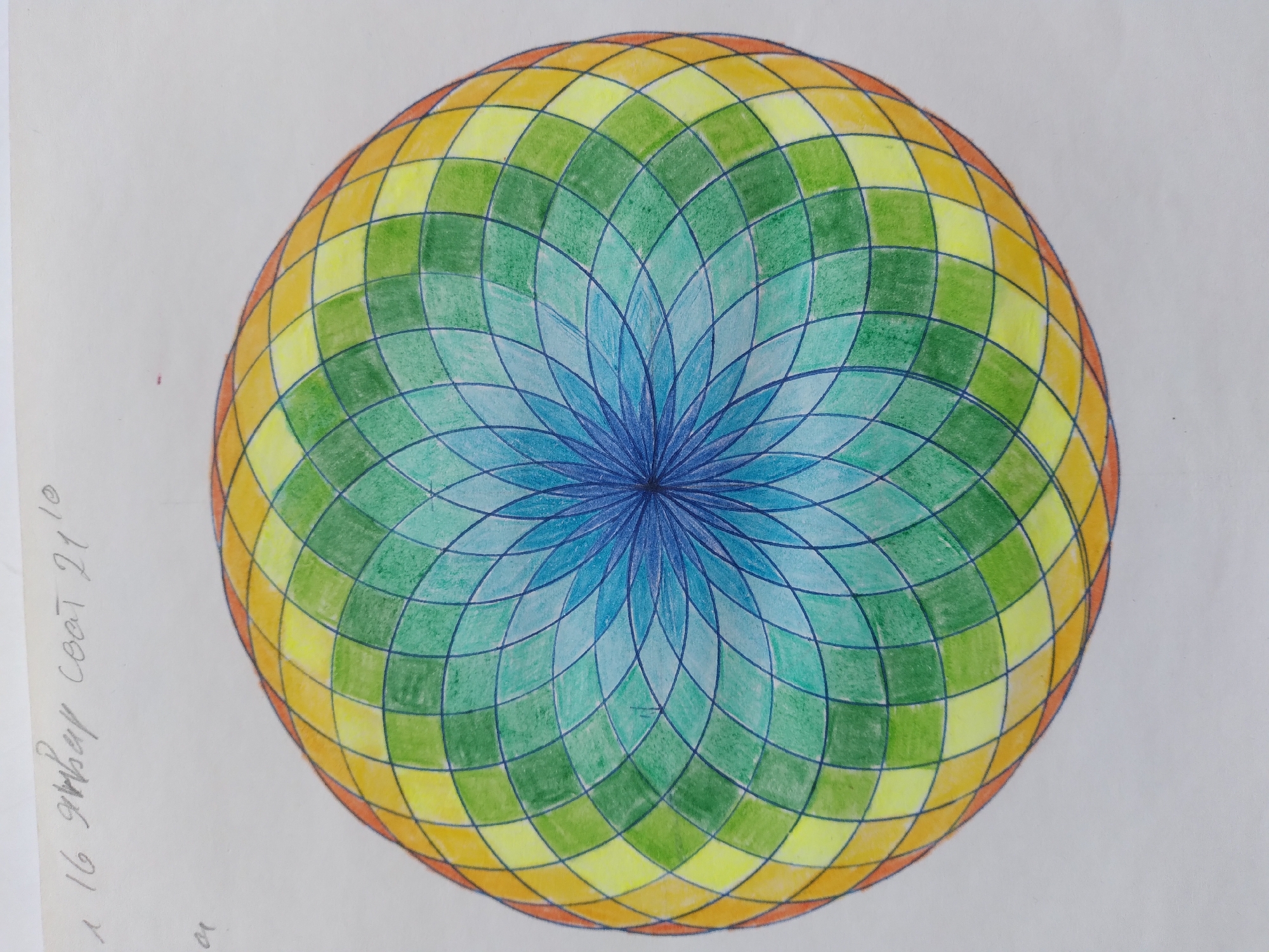 The image is a top-down view of a colorful, geometric mandala-like drawing on a white paper surface. The drawing features a circular design with intricate patterns created by intersecting lines. The colors transition from a deep blue in the center, through various shades of green and yellow, to orange on the outer edge. The drawing appears to be made with colored pencils or crayons, with visible strokes and some slight smudging. There is some faint handwriting in gray pencil in the upper left corner of the image, which appears to be a date or inscription. There is also a small, faint red mark to the left of the drawing. The overall impression is of a handcrafted artwork, possibly a study in symmetry and color. The drawing does not depict any specific location in the city of Baku, Uzbekistan or any other geographical location.