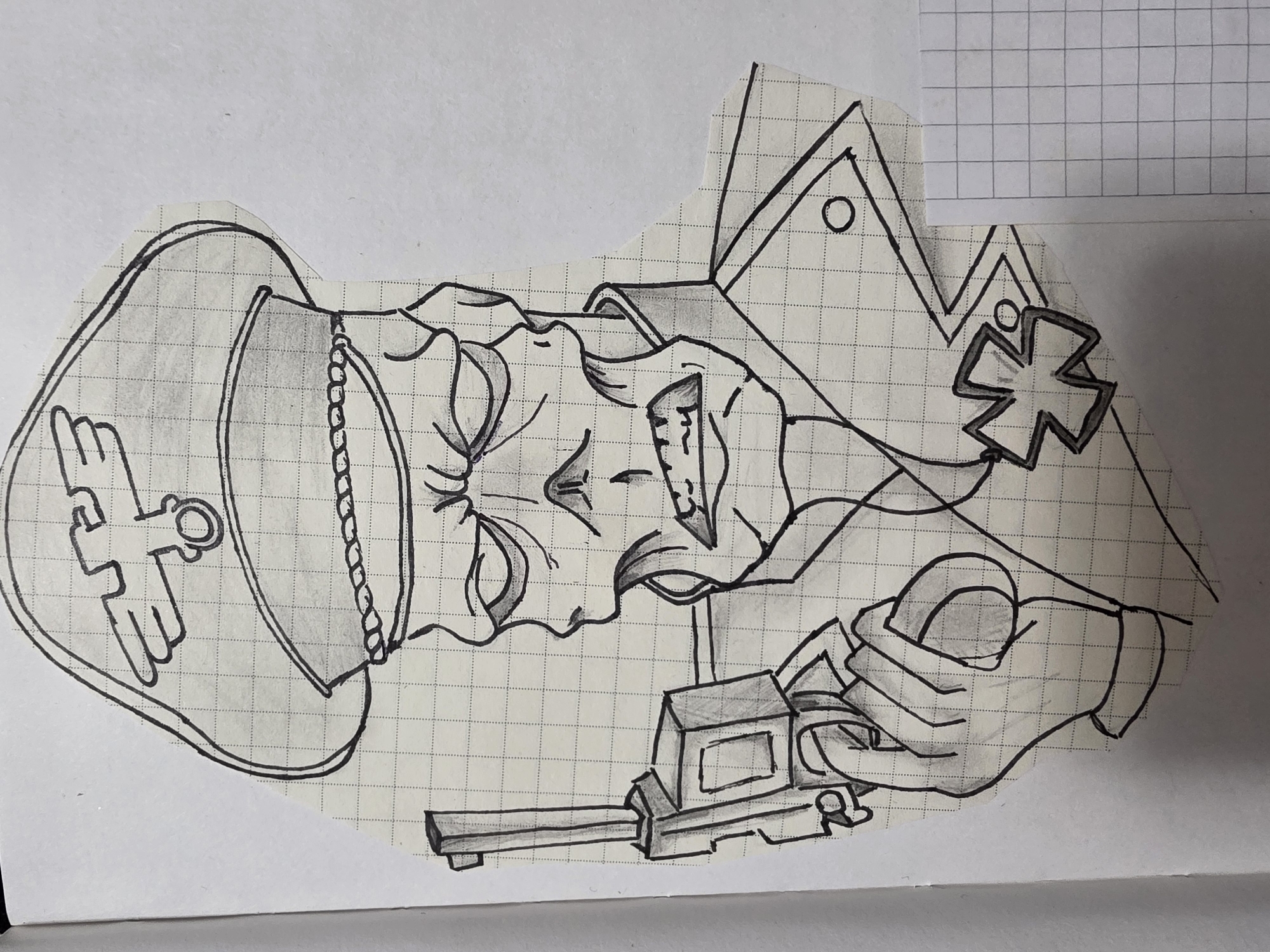 A black-and-white line drawing on graph paper depicts a man in a military uniform, holding a gun to his head. The man is wearing a hat with an eagle emblem and has a cross on his lapel. He has a distorted facial expression with bared teeth. The gun is a large, boxy weapon with a long barrel. The drawing is cut out and placed on a larger sheet of graph paper in the bottom left corner of the notebook. The city and location are not known.