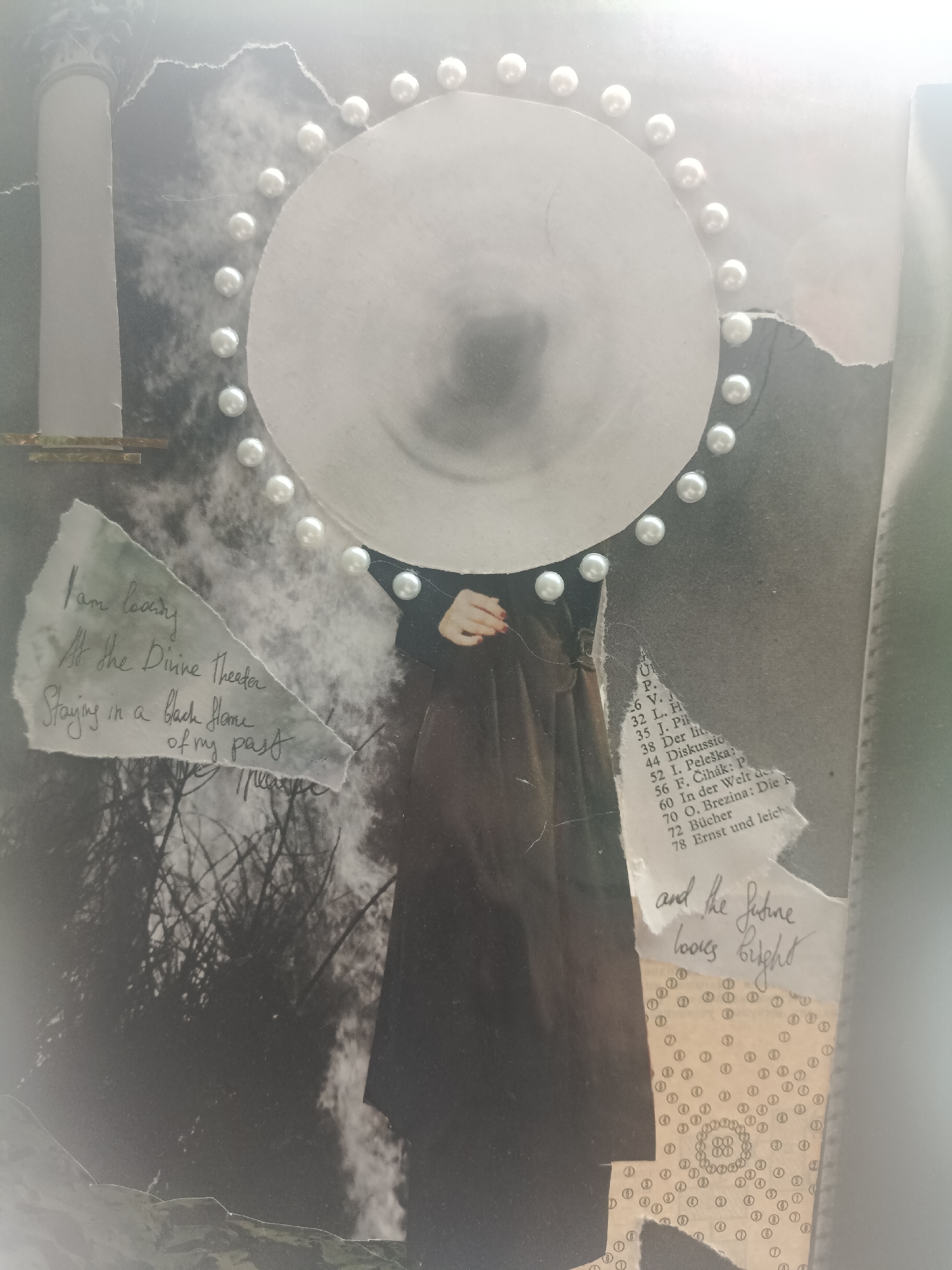 This is a photograph of a collage. The collage features a central circular element adorned with a border of small white pearls. Behind this circle is a blurred, silhouetted figure wearing a dark garment. To the left of the figure, a piece of torn paper displays handwritten text in cursive. The text reads, "I am lonely / At the Divine theater / Staying in a black frame / of my past." Below this, another piece of torn paper contains handwritten text that says, "and the future / looks bright." To the right of the figure, a fragment of a printed page with numbered entries is visible, with some text in German. The background is a dark, textured collage. There are no discernible elements that place this image in Moscow, Russia.