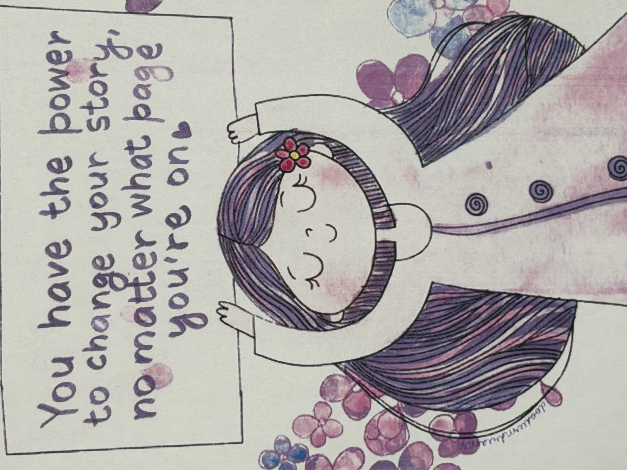 The image is a drawing of a stylized girl with purple hair lying on a bed of purple and blue flowers. She is holding a white rectangular sign with the message: "You have the power to change your story, no matter what page you're on <3". The background is white and the drawing has a whimsical, watercolor style. There is a signature at the lower right "doodendream".