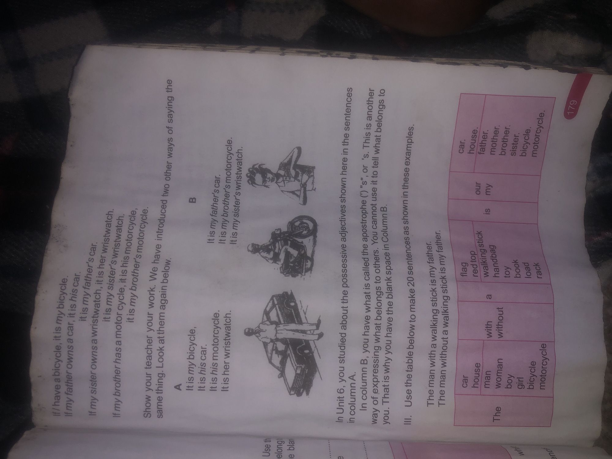 The image is a page from a book, featuring text and illustrations related to English grammar, specifically possessive adjectives and nouns. There are no elements within the image that provide any information about the city of Jalingo, Nigeria. The content is educational, with sentences demonstrating ownership and a table designed for sentence construction exercises. The illustrations depict a man with a car, a person on a motorcycle, and a child. The page is numbered "179" at the bottom right.