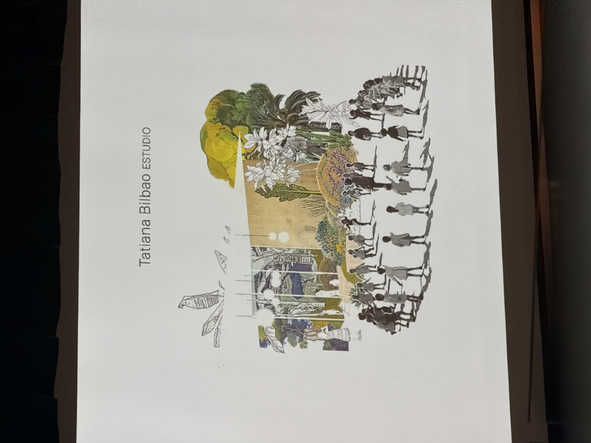 The image is a poster or print featuring the text "Tatiana Bilbao ESTUDIO" vertically aligned on the left side. The main image appears to be a collage or mixed-media artwork, possibly a architectural design concept, incorporating elements of nature, architecture, and people. There are illustrations of plants, trees, and flowers interspersed with architectural elements. A silhouetted group of people in simple dresses is present, suggesting a communal or social aspect of the design. The location in the city is unspecified.