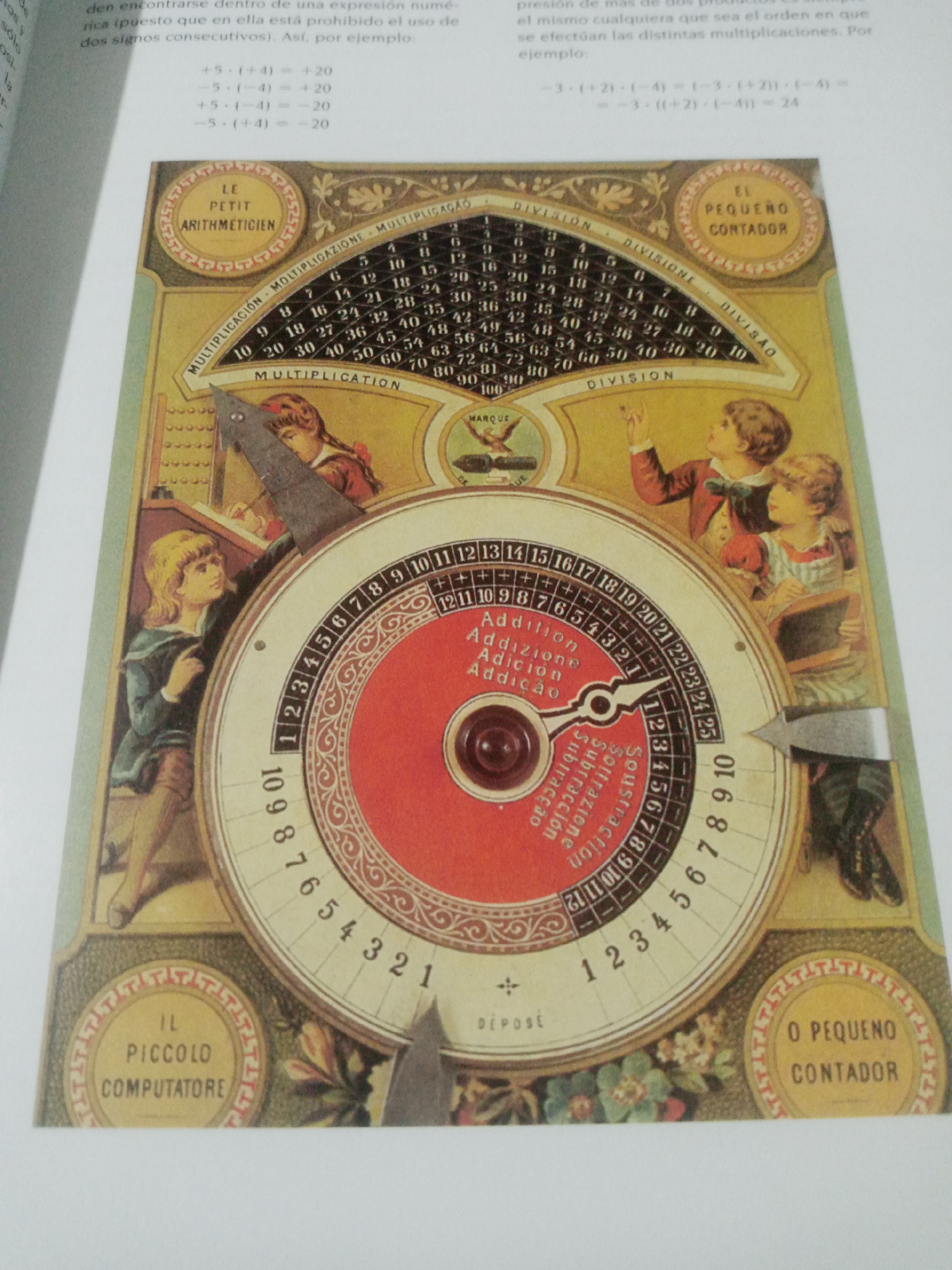This is a photograph of a page from a book or magazine, showing an illustration of a vintage mechanical calculating device. The device is circular and features multiple rotating disks with numbers and text in different languages, suggesting it could perform various mathematical operations such as addition, subtraction, multiplication, and division. The illustration is ornate, with decorative borders and imagery of children engaged with the device. The surrounding text, in Spanish, discusses mathematical principles. There is no information within the image or visible context to suggest a location in Santa Ana, Venezuela.