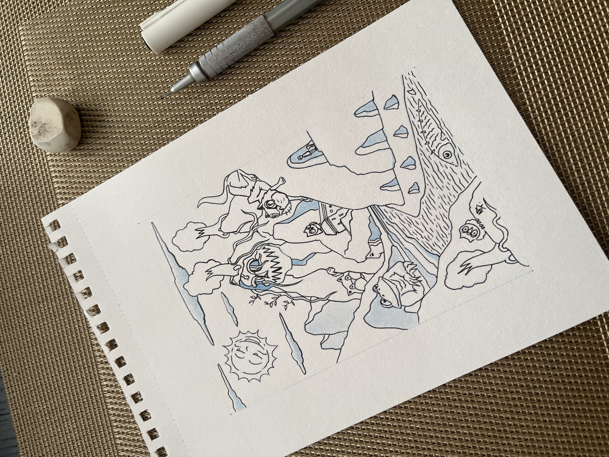 The image displays a detailed line art drawing, partially colored with light blue, situated on a white sheet of paper from a spiral-bound pad. The paper rests on a textured, golden-brown surface, likely a woven mat. Adjacent to the drawing are an off-white eraser, a silver mechanical pencil, and a white pen cap, suggesting an artistic workspace in Krasnoyarsk, Russia.
The drawing itself features a whimsical and somewhat surreal landscape populated by various stylized figures and elements. On the left, a smiling sun radiates lines amidst several jagged, icicle-like shapes and soft, cloud-like forms, some tinted light blue. Throughout the central and upper sections, several cartoonish characters are depicted in dynamic poses, suggesting movement or an event in progress. One figure with long, flowing hair is surrounded by clouds, while another, with prominent teeth and wide eyes, appears to be interacting with a blue, smoke-like element. A character's foot, encased in a sneaker, is visible near the top, seemingly falling or standing on an abstract surface. Another figure with a backpack and what resembles a sleeping bag is seen further up.
On the right side, a large, textured tree-like or rock-like structure dominates, featuring distinct wood grain patterns and an eye-like knot. Smaller, multi-eyed creatures and a frog-like entity are also integrated into the scene. The drawing employs clean black outlines with selective light blue shading to highlight clouds, icicles, and parts of the characters, creating a graphic and illustrative aesthetic. The scene conveys a sense of fantastical movement and interaction within an imaginative, possibly cold or airborne, environment during the daytime, indicated by the smiling sun. No visible text is present in the drawing or on the surrounding objects.