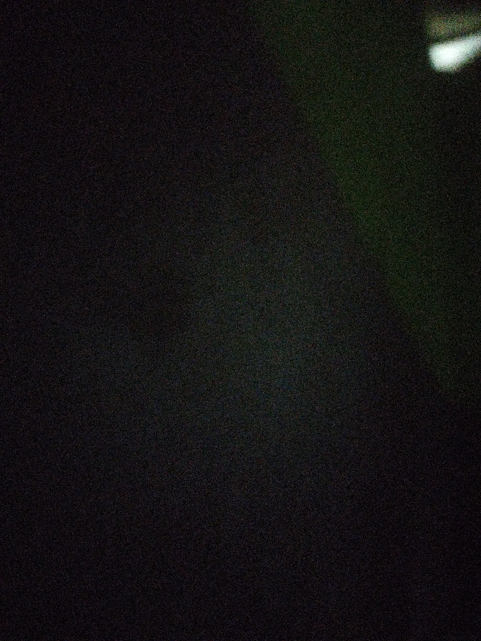 The image is completely black with a slight green tint in the top right corner. The coordinates provided correspond to a location in the city of Subang, Indonesia. No people, subjects, or objects are visible in the image. There is no action or interaction to be seen. The environment is completely dark.
