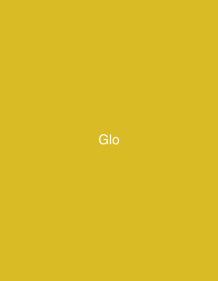 The image displays a solid, uniform mustard yellow background. Centered both horizontally and vertically on this background is the word "Glo," rendered in plain white, sans-serif capital letters. No other visual elements, figures, objects, or environmental details are depicted within the image. This graphic is presented as a standalone branding or textual element, associated with the city of Casablanca, Morocco.