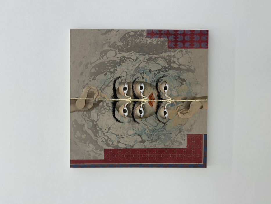A canvas displays a face with four eyes, reflected in a golden line suggesting water. Marble-like patterns fill the upper portion, transitioning to mirrored patterns below. Hands reach towards the reflection from both sides. A red and blue geometric border adorns the bottom edge, with a matching pattern near the top corner. The artwork is mounted on a plain white wall.