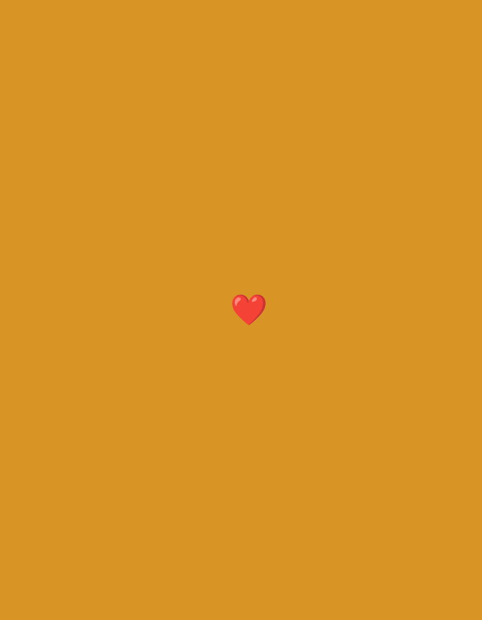 A small, red heart emoji is centered on a flat, muted orange background. The background occupies the entirety of the image.