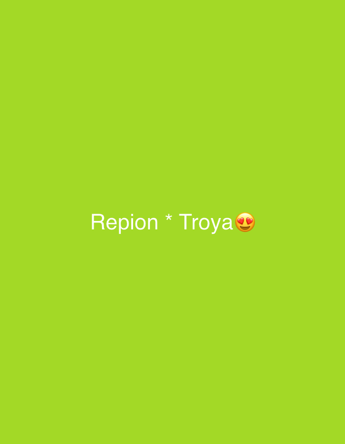 A solid, bright green background with white text in the center reads "Repion * Troya" with two heart-shaped eyes emojis. The image is a digitally created graphic or a photograph of text on a colored background. There is no discernible location within the city of Oviedo, Spain.