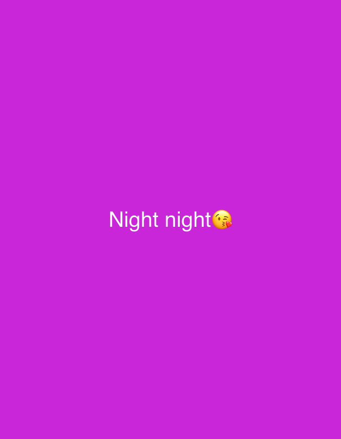 The image displays a simple, solid purple background. Centered horizontally and slightly above the vertical midpoint, white text reads "Night night". Immediately to the right of the text, there is a yellow kissing face emoji (😘). The emoji shows a closed eye winking and puckered lips with a small red heart, indicating affection or a fond farewell. There are no other subjects, objects, or discernible scenes or settings present in the image. The background is a uniform, vibrant shade of purple. The overall impression is a digital message conveying a goodnight wish. There are no specific location or weather cues, and the time of day is only implied by the text.