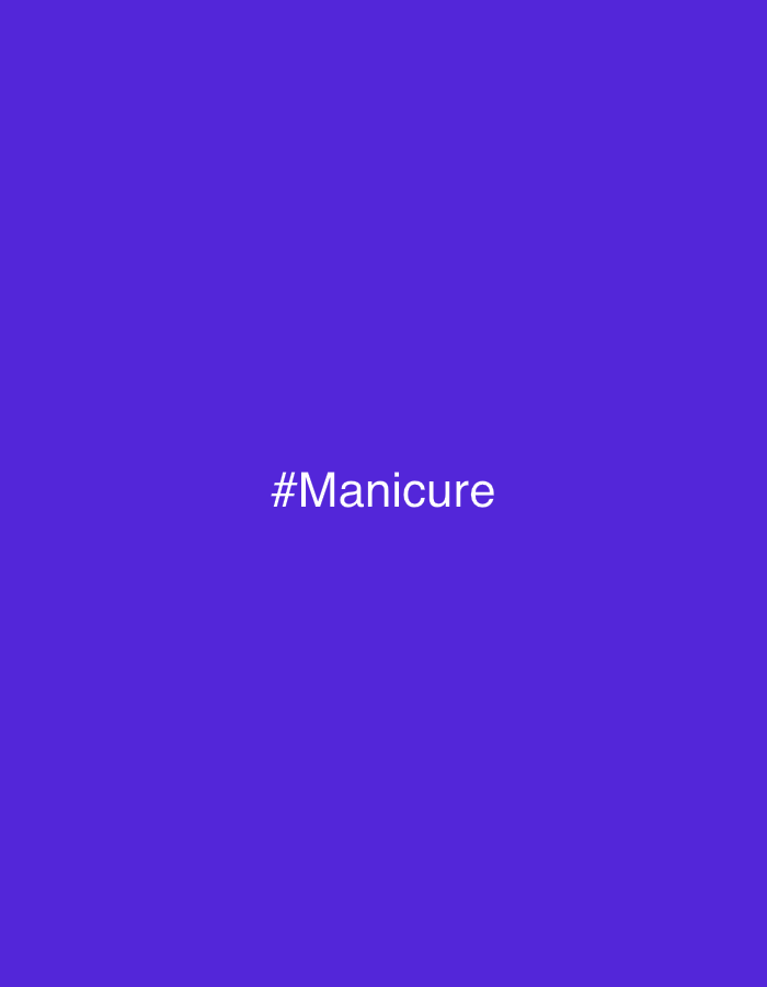 The image shows the text "#Manicure" in white, centered on a uniform purple background. There are no other objects, people, or environmental details visible. The city and location are unknown.