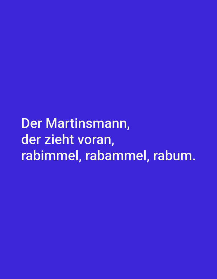A digital image features white text on a vibrant royal blue background. The text reads "Der Martinsmann, der zieht voran, rabimmel, rabammel, rabum." There are no discernible locations in Tallinn, Estonia, or any people, subjects, objects, or actions present in the image.