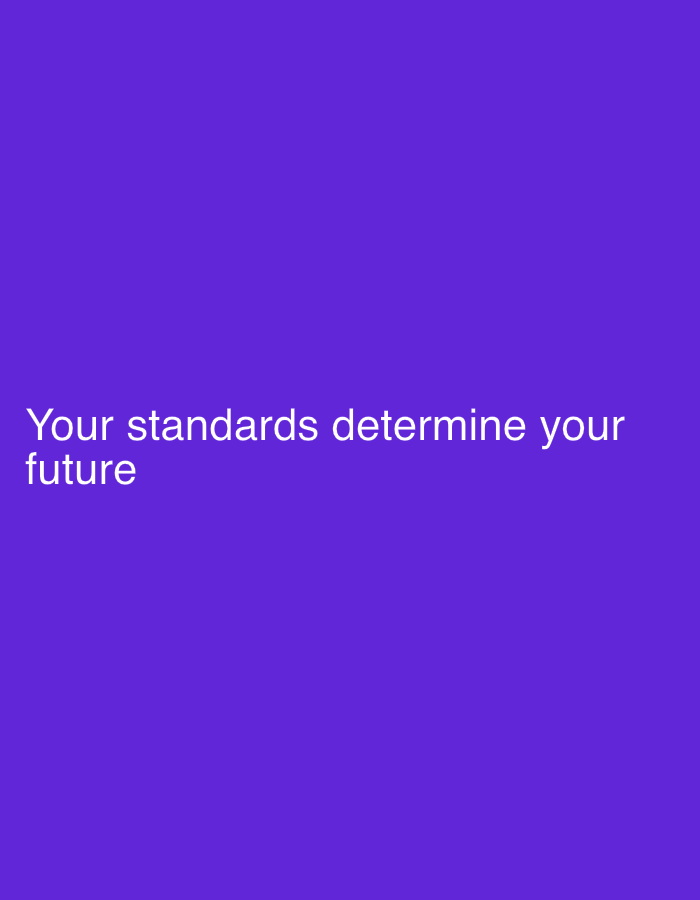 The image is a solid purple background with the white text "Your standards determine your future" near the bottom left. There is no indication of the image being taken in Woking, United Kingdom, or any other location.