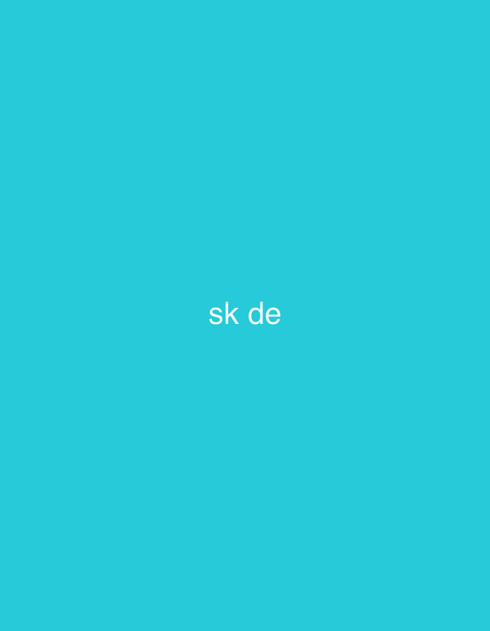 The image displays a solid, uniform turquoise-blue background. Centered on this field are the white, sans-serif lowercase letters "sk de", clearly rendered and well-defined. The letters "sk" are separated from "de" by a single space. No other figures, objects, individuals, or environmental features are present in the scene, which is depicted as being in Casablanca, Morocco.
