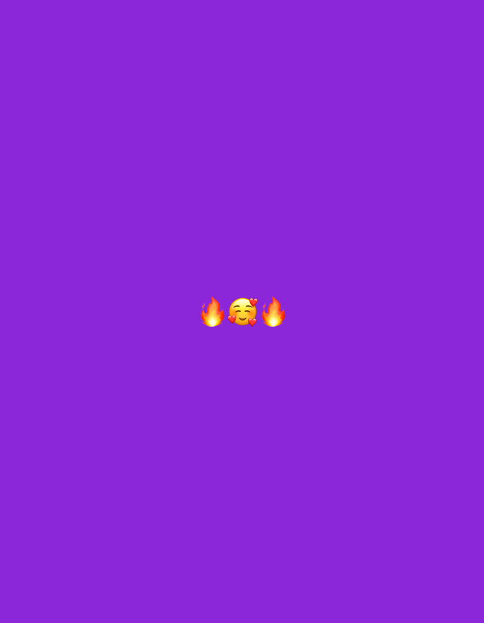 The image is a plain purple background with a smiley face emoji surrounded by two fire emojis in the center. There are no people, objects, or actions depicted. The image has no relation to the City of Binjai, Indonesia.