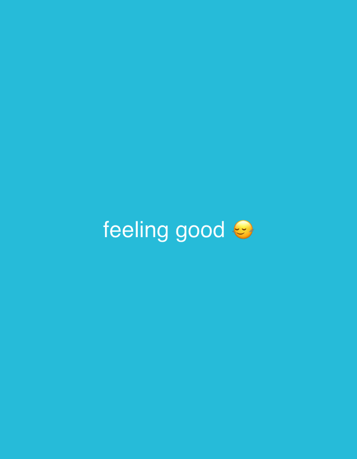 The image is a bright, solid cyan background with the text "feeling good" written in white, sans-serif font. To the right of the text is a yellow emoji with closed eyes and a slight smile. There are no people, objects, or discernible environmental features present in the image, apart from the text and emoji, which appear to be digitally overlaid. The location of Ikeja, Nigeria, is not represented in this image.