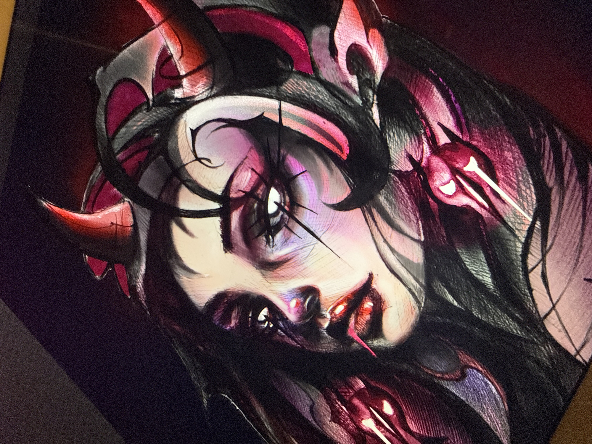 The media file showcases a highly stylized, close-up portrait of a female figure, characterized by elements of dark fantasy. The subject's face is depicted at an angle, gazing upwards and to the right, with a striking and intense expression.
**Subjects:** The central subject is a woman with distinctive features. Her eyes are prominent, with bright white irises and pupils from which sharp, dark lines radiate. Her lips are full and red, with a small, bright red, possibly snake-like or forked tongue visible. She is adorned with noticeable, reddish-black horns that curve from her temples, and intricate, ornate headwear that frames her face and ears. This headwear features dark, skeletal-like outlines with glowing pink and red accents. Her hair is dark and flowing, blending into the background, with hints of purple and red.
**Objects:** The main objects are the figure's horns and the elaborate, almost thorny or mechanical-looking headwear.
**Scene/Setting:** The image is a dramatic, close-up portrait, isolating the figure against a dark, abstract background that emphasizes her glowing features. The setting is undefined, focusing solely on the artistic rendition of the character.
**Notable Details:** The artwork employs a bold and contrasting color palette, featuring deep blacks and dark purples alongside vivid, glowing reds, pinks, and whites. This creates a strong sense of internal illumination and highlights. The style suggests digital art, a highly rendered painting, or a tattoo design, characterized by sharp lines, dramatic shading, and strong visual impact. There is no visible text in the image. The location context (Sofia, Bulgaria) is external to the artwork's content.
