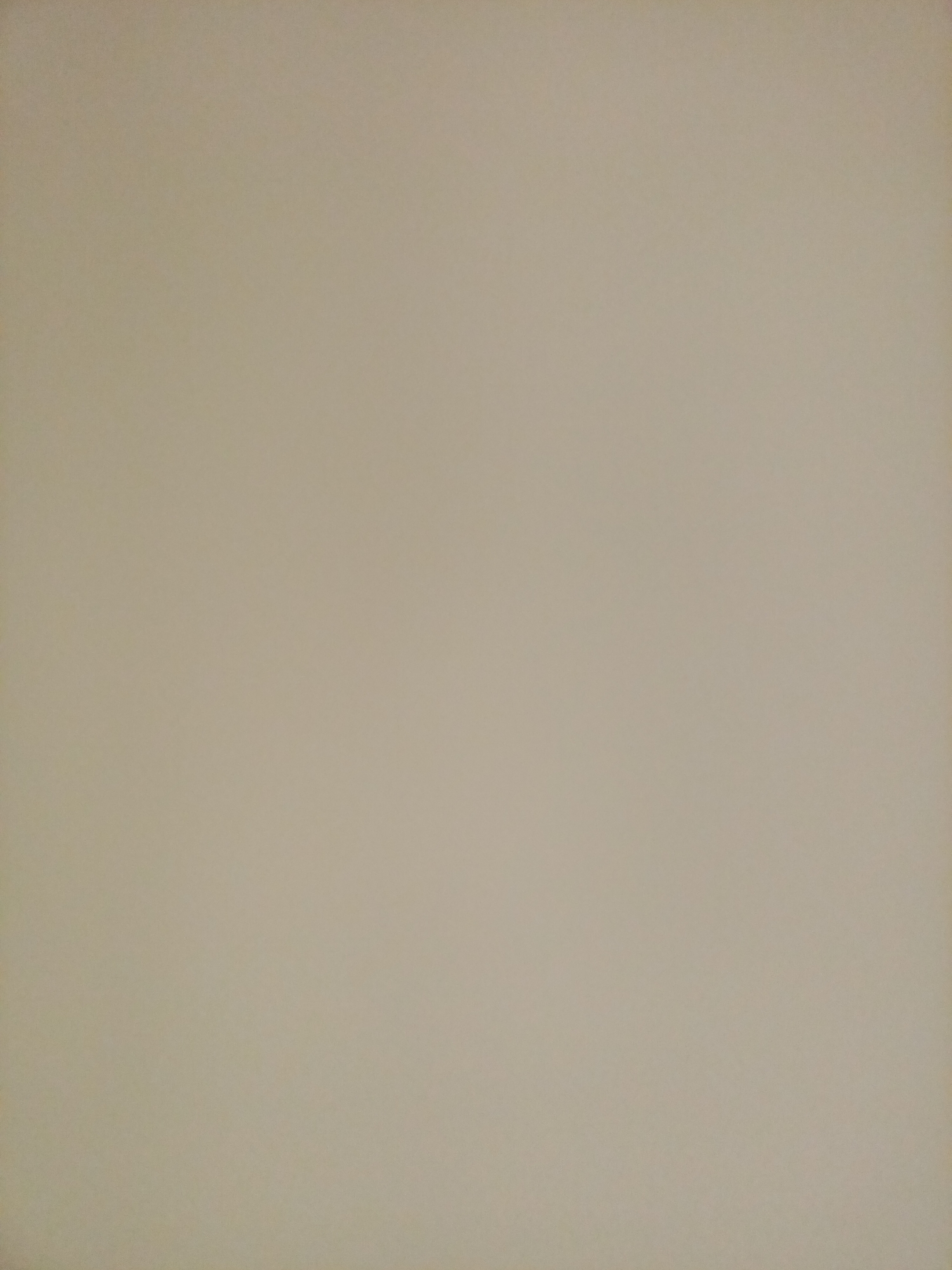 The image is a plain, light beige or tan background, suggesting a blank wall or surface. There are no discernible objects, people, or any specific features within the frame. The lighting is even, and there are no shadows or highlights to indicate a specific environment or time of day. The scene does not provide any information or context related to the city of Rostov-on-Don, Russia, or any other location.