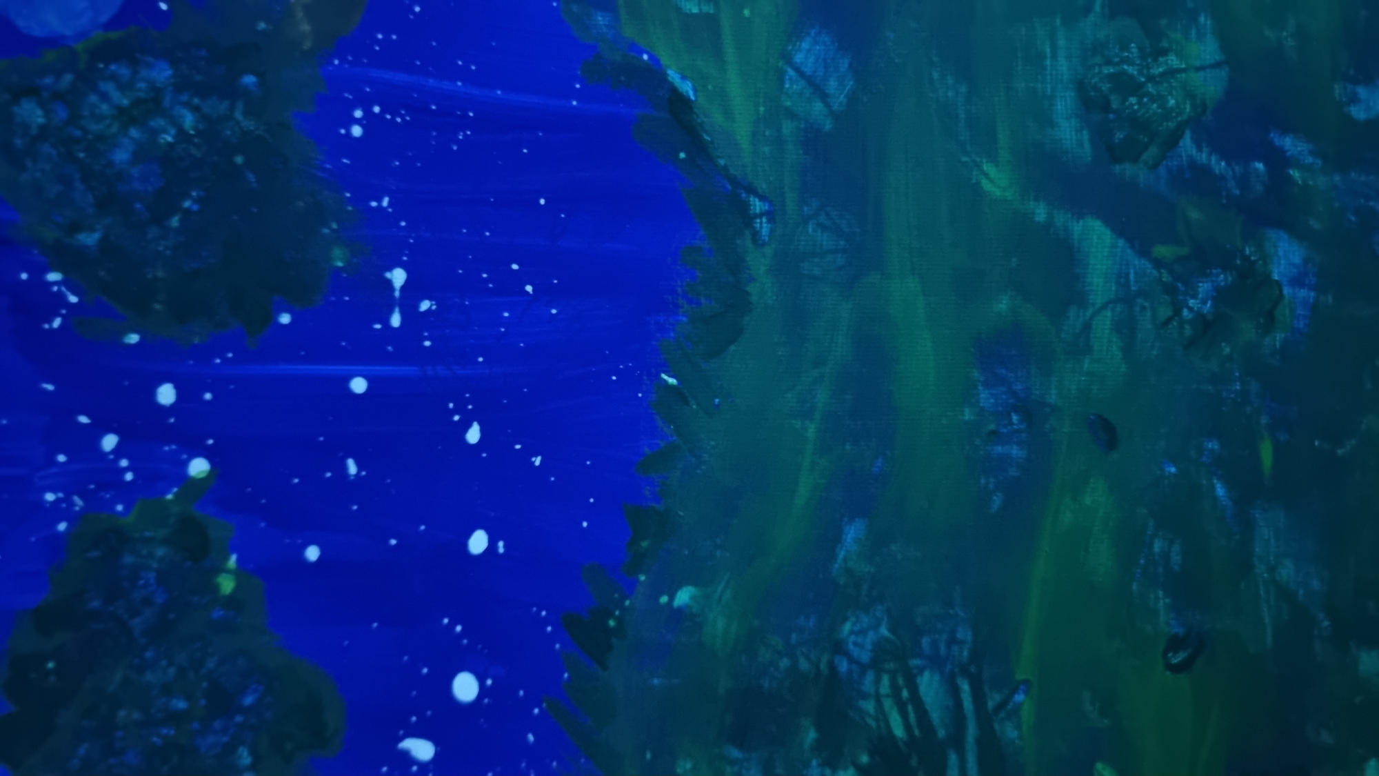 This is an abstract painting with a dark blue sky speckled with white dots, possibly representing stars. The lower portion of the painting features dark green and blue abstract shapes that suggest foliage or a landscape. The painting does not depict any recognizable location in Heidenheim an der Brenz, Germany, nor does it contain any people, subjects, objects, or actions. It is a non-representational artwork.