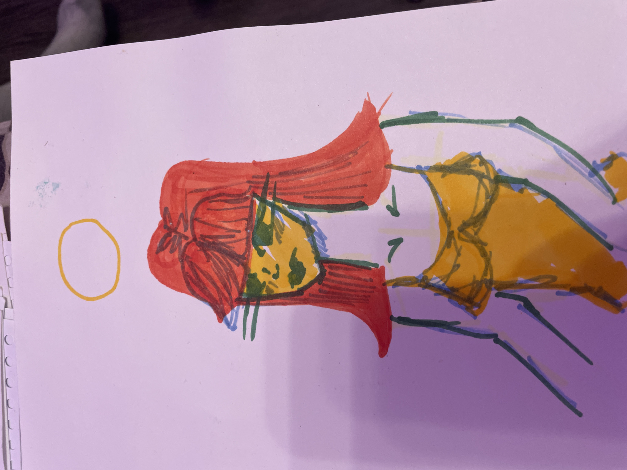 The image is a drawing on white paper of a person with red hair, yellow skin, and green eyes. The person is wearing a yellow top. A yellow circle is drawn above the person's head. The drawing is done with markers. The background is a pinkish-purple color. There is no indication of Vaganovo, Russia in the image.