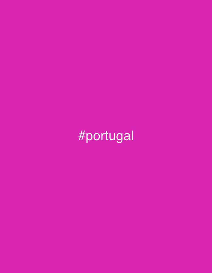 The image presents a solid magenta background. Centered on this uniform field is the white text "#portugal". There are no discernible people, subjects, objects, actions, interactions, or environmental details visible within the image. The specified location associated with this digital graphic is the city of Santarém, Portugal.