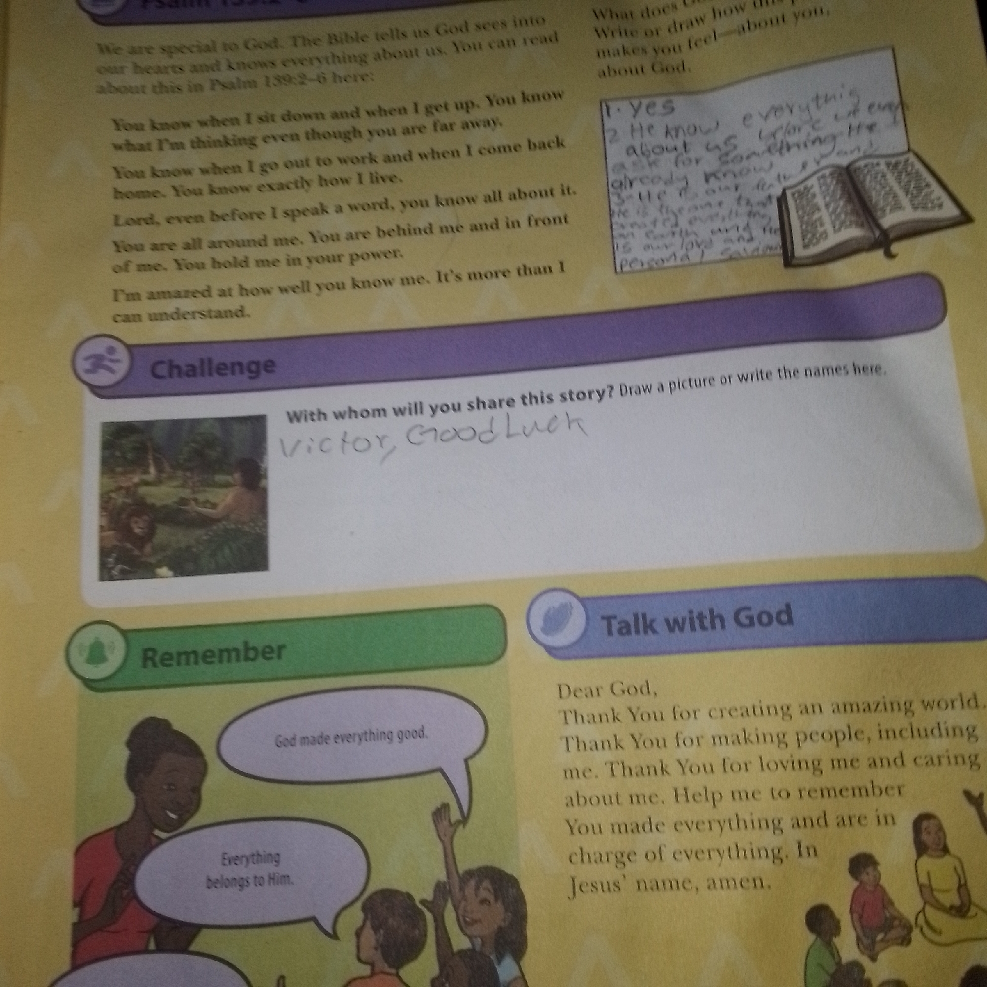 The image is a close-up of a page from a children's book or workbook, featuring text, illustrations, and handwritten entries. The page is divided into sections, with titles like "Challenge" and "Remember" and "Talk with God."
In the "Challenge" section, there is an illustration of a person in a lush, green environment with a lion nearby. Next to it, the text asks, "With whom will you share this story? Draw a picture or write the names here." Below this text, a handwritten entry reads, "Victor, Good Luck."
The "Remember" section shows a cartoon illustration of a woman speaking to children, with speech bubbles containing text like "God made everything good" and "Everything belongs to Him."
The "Talk with God" section contains a prayer written in text, starting with "Dear God, Thank You for creating an amazing world."
In the top right corner, there is a handwritten list with items numbered 1, 2, and 3, referencing God and His knowledge and love. A drawing of an open Bible is also present next to this handwritten list. The overall background of the page is a yellowish-beige, with purple and green colored borders or headers for the different sections.