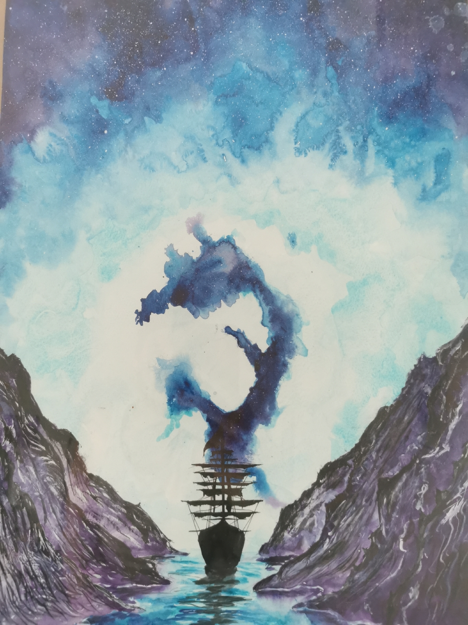 This watercolor painting presents a fantastical and dramatic seascape under a cosmic sky. A large, dark silhouette of a multi-masted sailing ship, resembling a galleon, dominates the lower center, seen from the bow as it navigates forward. The ship is positioned in a narrow waterway, flanked by two towering, rugged cliffs that rise steeply on either side. These cliffs are rendered in dark purples and blues, with visible textures suggesting rock formations.
The water below the ship is serene, reflecting the deep blues and purples of the sky with subtle ripples, adding depth and luminosity to the scene. Above, the sky transitions from a deep indigo and dark purple at the top, speckled with numerous white dots representing stars, to lighter shades of blue and teal towards the horizon. Central to the sky, directly above the ship, is a prominent, amorphous formation resembling a glowing nebula or a cosmic cloud. This formation is a striking mix of deep blues and purples, appearing dense and intricate, with lighter, almost luminous edges that contrast sharply with the surrounding lighter sky.
The overall mood is one of wonder, mystery, and adventure, evoking a sense of exploration into an unknown, perhaps magical, realm. The artwork's style is clearly watercolor, utilizing its characteristic fluid washes, blending, and visible brushstrokes, particularly evident in the sky's gradients and the textural details of the cliffs and water. There is no visible text in the image.