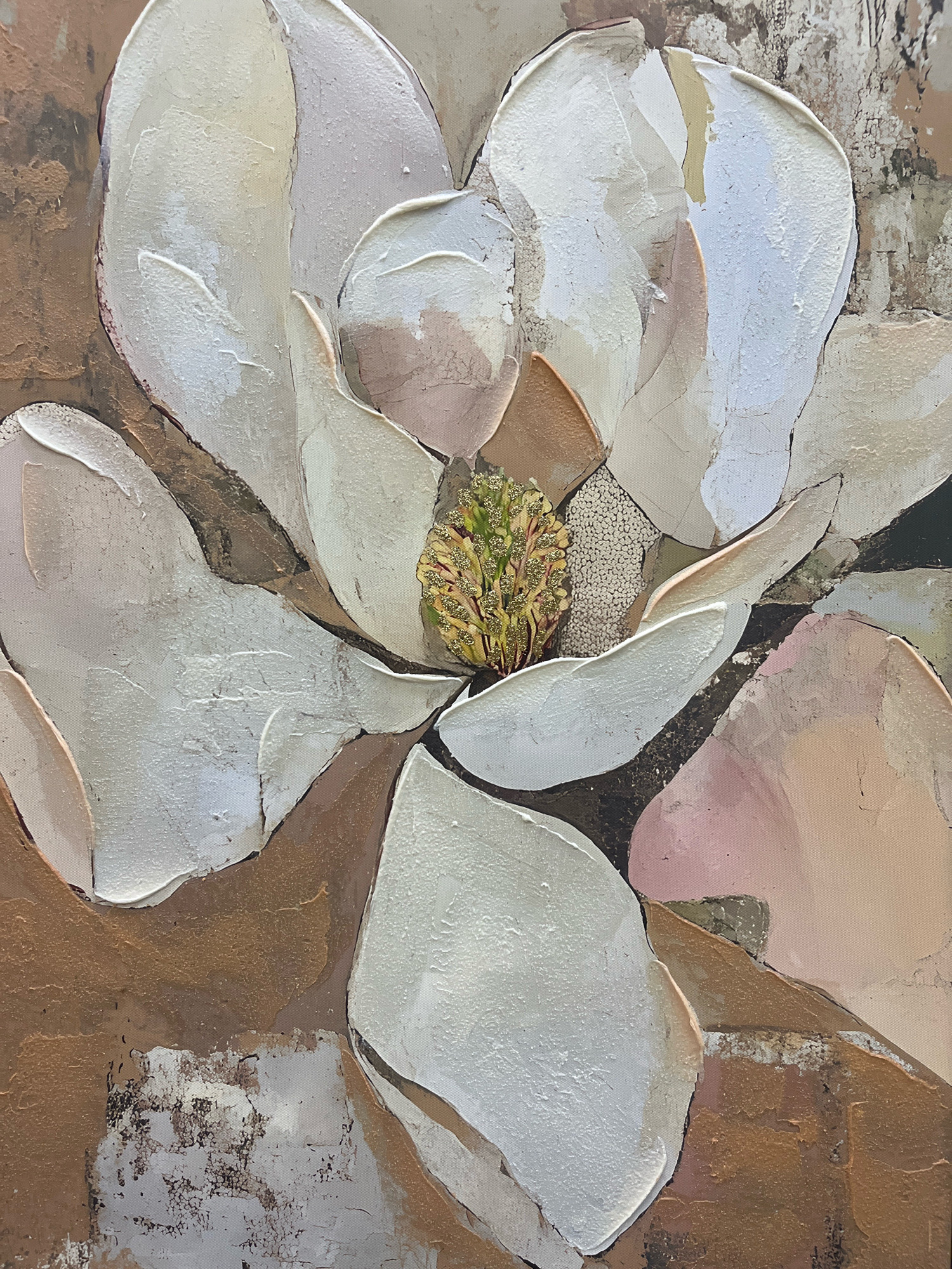 This is a close-up, textured painting of a white magnolia flower. The petals are thick with impasto, creating a sculptural effect. The center of the flower features a detailed stamen, adorned with gold glitter. The background is a mosaic of earthy tones, including browns, tans, and muted pinks, with some areas of rough texture suggesting bark or aged canvas. There are no people, animals, or recognizable objects from Firozpur, India present in this image. The scene is entirely an artistic representation of a flower.