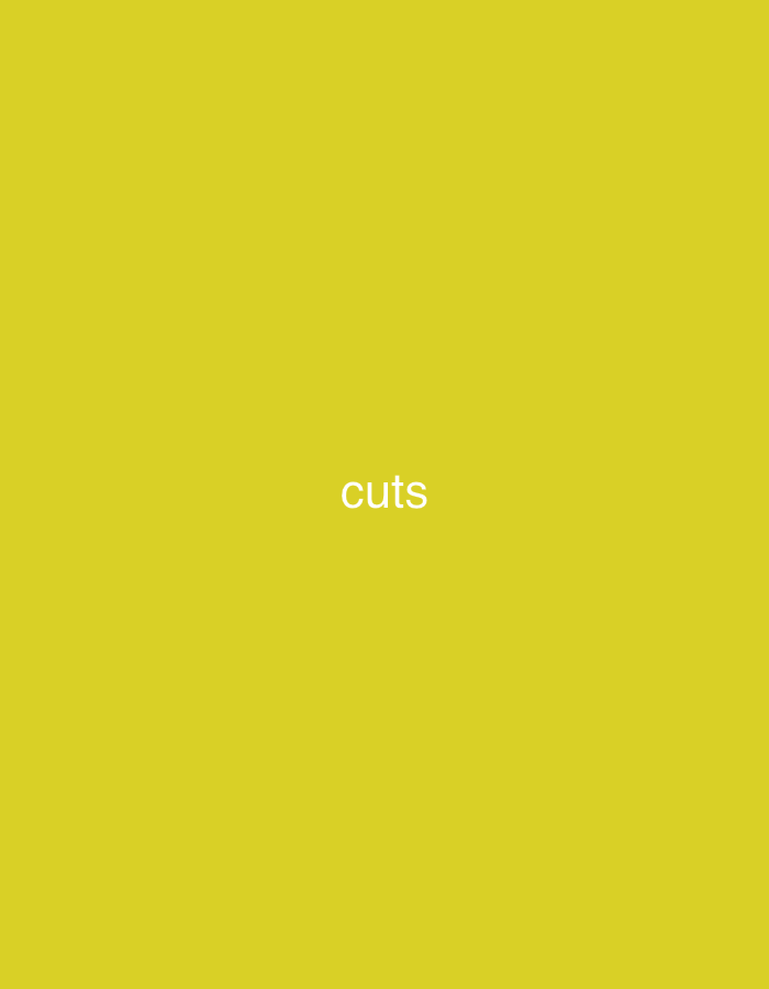 The image displays the word "cuts" in white text, centered horizontally and positioned in the lower middle section of the frame. The background is a solid, bright yellow color. There are no people, objects, or discernible scenes present. The image is a simple graphic with text on a colored background. The text "cuts" is the only element of note.