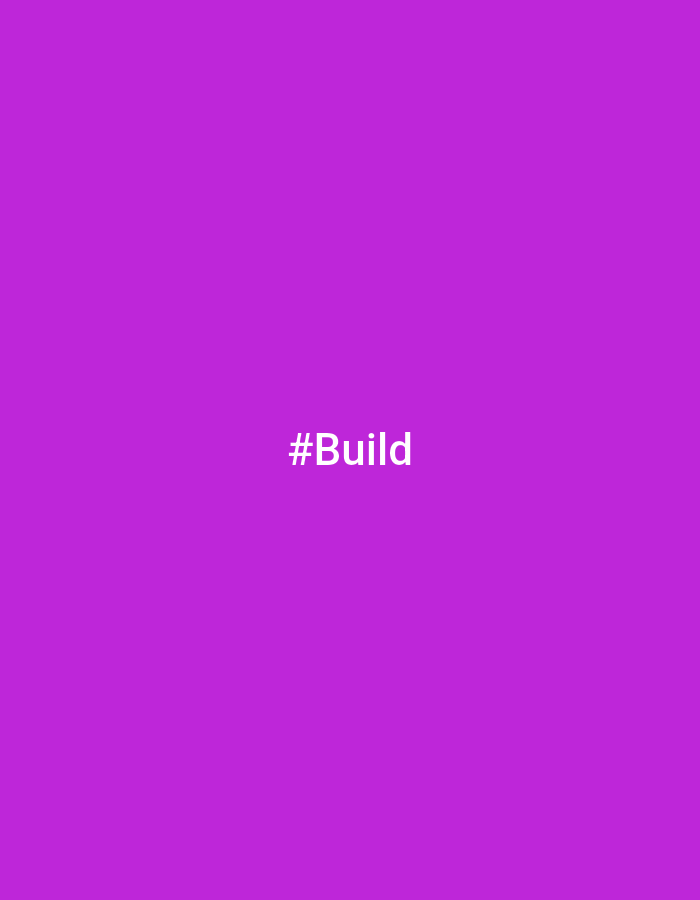 The image shows the text "#Build" in white font, centered on a solid purple background. There are no other objects or people in the image. The location is not specified and is labeled as Unknown, Unknown.